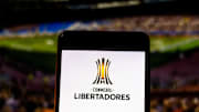 In this photo illustration a Copa Libertadores logo seen...