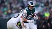 Dec 14, 2025; Philadelphia, Pennsylvania, USA; Philadelphia Eagles tight end Dallas Goedert (88) catches the ball for a first down against Las Vegas Raiders safety Isaiah Pola-Mao (20) during the second quarter at Lincoln Financial Field. 