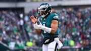 Dec 14, 2025; Philadelphia, Pennsylvania, USA; Philadelphia Eagles quarterback Jalen Hurts (1) reacts after running back Saquon Barkley (26) (not pictured) scores a touchdown against the Las Vegas Raiders during the second quarter at Lincoln Financial Field. 