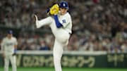 Los Angeles Dodgers starting pitcher Roki Sasaki (11) delievers a pitch in the first inning against the Chicago Cubs during the Tokyo Series at Tokyo Dome. 