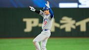 Los Angeles Dodgers designated hitter Shohei Ohtani (17) reacts after hitting a double in the ninth inning against the Chicago Cubs during the Tokyo Series at Tokyo Dome on March 18.