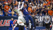 UTSA wide receiver Zakhari Franklin (4) battles Western Kentucky's Antwon Kincade (1) in the 2021 Conference USA championship game at the Alamodome.