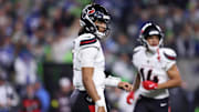 Oct 20, 2025; Seattle, Washington, USA; Houston Texans quarterback C.J. Stroud (7) looks to the sideline during the fourth quarter against the Seattle Seahawks at Lumen Field. Mandatory Credit: Kevin Ng-Imagn Images
