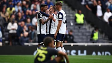 Romero, Maddison, and Van de Ven celebrate Romero's goal against Everton