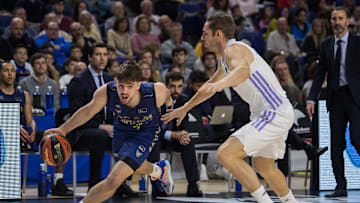 Urban Klavzar (L) and Fabien Causuer (R) during Real Madrid...