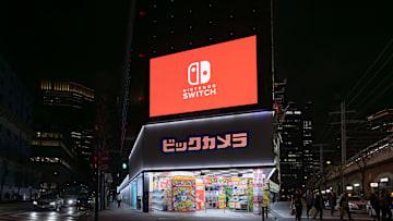 Biccamera store at night in central Tokyo displays a...