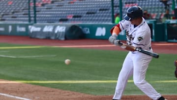 Dayson Croes #12 of Kane County Cougars at the bat during...