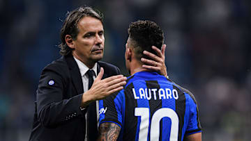Simone Inzaghi (L), head coach of FC Internazionale, hugs...