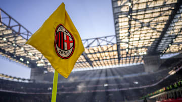 A corner flag bearing the logo of AC Milan is seen during...