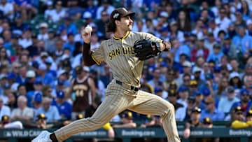 Oct 1, 2025; Chicago, Illinois, USA; San Diego Padres starting pitcher Dylan Cease (84) delivers a pitch against the Chicago Cubs in the first inning during game two of the Wildcard round for the 2025 MLB playoffs at Wrigley Field. Mandatory Credit: Matt Marton-Imagn Images