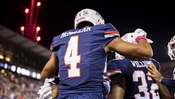 Oct 1, 2022; Tucson, Arizona, USA; Arizona Wildcats wide receiver Tetairoa McMillan (4) celebrates after catching a touchdown pass against the Colorado Buffaloes in the first half at Arizona Stadium. Mandatory Credit: Ivan Pierre Aguirre-USA TODAY Sports