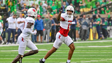 Sep 28, 2024; South Bend, Indiana, USA; Louisville Cardinals safety Tamarion McDonald (12) reacts after recovering a fumbled kickoff against the Notre Dame Fighting Irish in the first quarter at Notre Dame Stadium. Mandatory Credit: Matt Cashore-Imagn Images