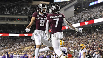 Nov 26, 2022; College Station, Texas, USA;  Texas A&M Aggies wide receiver Moose Muhammad III (7) celebrates with wide receiver Noah Thomas (9) after scoring a  touchdown against the LSU Tigers during the fourth quarter at Kyle Field. Mandatory Credit: Maria Lysaker-USA TODAY Sports