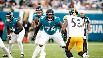 Aug 9, 2025; Jacksonville, Florida, USA; Jacksonville Jaguars offensive tackle Fred Johnson (74) prepares to block a rusher against the Pittsburgh Steelers during a preseason game at EverBank Stadium. Mandatory Credit: Travis Register-Imagn Images