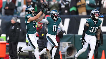 Dec 14, 2025; Philadelphia, Pennsylvania, USA; Philadelphia Eagles linebacker Zack Baun (53) celebrates with cornerback Adoree' Jackson (8) and safety Marcus Epps (39) after an interception during the third quarter at Lincoln Financial Field. Mandatory Credit: Bill Streicher-Imagn Images