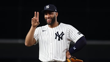 Oct 7, 2025; Bronx, New York, USA; New York Yankees third baseman Amed Rosario (14) celebrates during the Aaron Judge (99) (not pictured) home run in the fourth inning against the Toronto Blue Jays during game three of the ALDS round for the 2025 MLB playoffs at Yankee Stadium. Mandatory Credit: Vincent Carchietta-Imagn Images