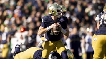 Dec 29, 2023; El Paso, TX, USA; Notre Dame Fighting Irish quarterback Steve Angeli (18) drops back to pass against the Oregon State Beavers defense in the first half at Sun Bowl Stadium. Mandatory Credit: Ivan Pierre Aguirre-Imagn Images