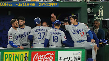 Mar 18, 2025; Bunkyo, Tokyo, JPN; Los Angeles Dodgers designated hitter Shohei Ohtani (17) celebrates with outfielder Teoscar Hernández (37) (left) after scoring a run in the fifth inning against the Chicago Cubs during the Tokyo Series at Tokyo Dome. 