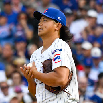 Oct 1, 2025; Chicago, Illinois, USA; Chicago Cubs relief pitcher Shota Imanaga (18) reacts after giving up a two-run home run in the fifth inning against the San Diego Padres during game two of the Wildcard round for the 2025 MLB playoffs at Wrigley Field. Mandatory Credit: Matt Marton-Imagn Images