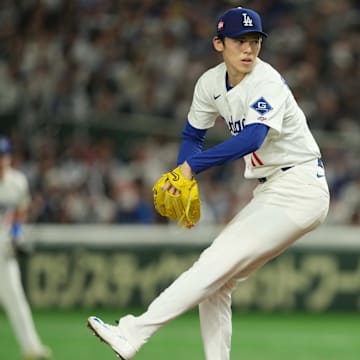 Mar 19, 2025; Bunkyo, Tokyo, JPN; Los Angeles Dodgers starting pitcher Roki Sasaki (11) delievers a pitch in the first inning against the Chicago Cubs during the Tokyo Series at Tokyo Dome. Mandatory Credit: Darren Yamashita-Imagn Images