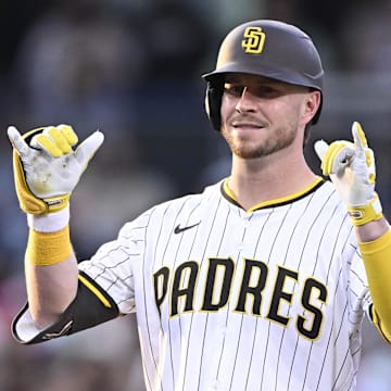 Sep 27, 2025; San Diego, California, USA; San Diego Padres first baseman Ryan O'Hearn (32) gestures after hitting a double during the second inning against the Arizona Diamondbacks at Petco Park. Mandatory Credit: Denis Poroy-Imagn Images