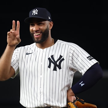 Oct 7, 2025; Bronx, New York, USA; New York Yankees third baseman Amed Rosario (14) celebrates during the Aaron Judge (99) (not pictured) home run in the fourth inning against the Toronto Blue Jays during game three of the ALDS round for the 2025 MLB playoffs at Yankee Stadium. Mandatory Credit: Vincent Carchietta-Imagn Images
