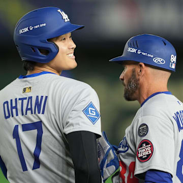 Mar 18, 2025; Bunkyo, Tokyo, JPN; Los Angeles Dodgers designated hitter Shohei Ohtani (17) reacts after hitting a single in the fifth inning against the Chicago Cubs during the Tokyo Series at Tokyo Dome. Mandatory Credit: Darren Yamashita-Imagn Images