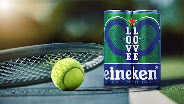 Heineken cans on a tennis court.