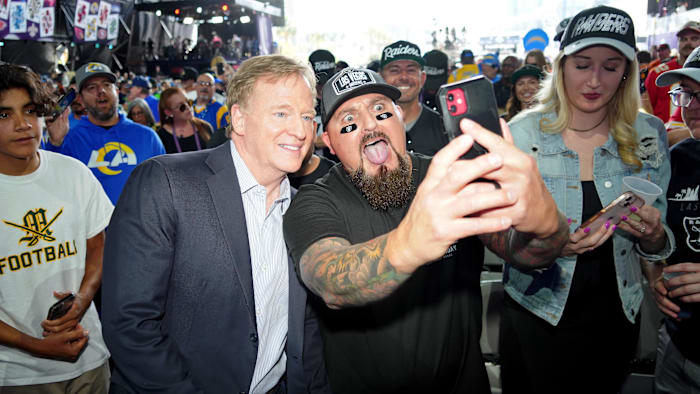 Apr 28, 2022; Las Vegas, NV, USA; NFL commissioner Roger Goodell poses for a photo with a Las Vegas