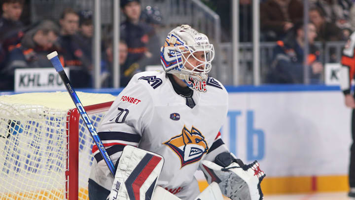 Ilya Nabokov (30) of Metallurg Hockey Club seen in action...