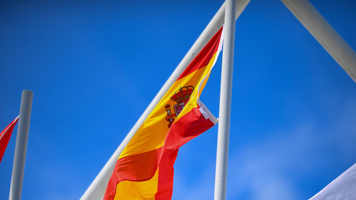 Spanish flag is seen raised at podium presentation of 2024...