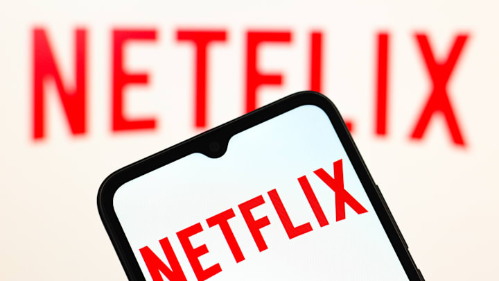 In this photo illustration, the Netflix logo is seen...