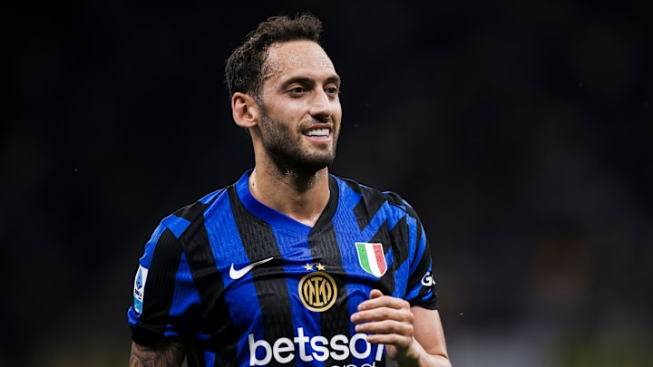 Hakan Calhanoglu of FC Internazionale smiles during the... Hakan Calhanoglu of FC Internazionale smiles during the...