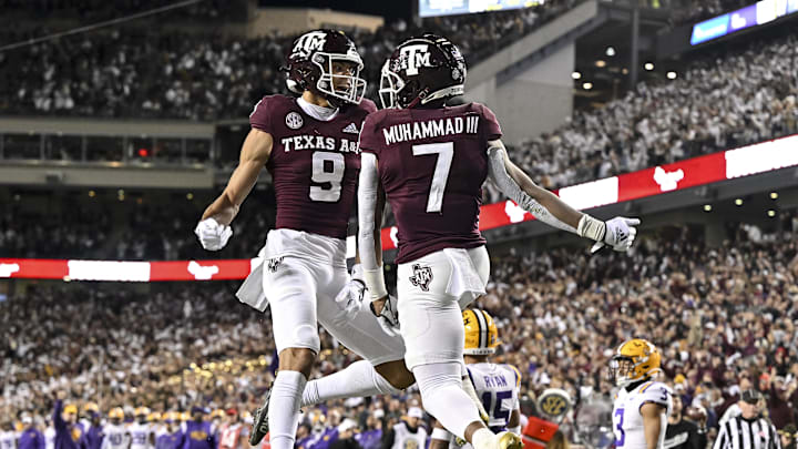 Nov 26, 2022; College Station, Texas, USA;  Texas A&M Aggies wide receiver Moose Muhammad III (7) celebrates with wide receiver Noah Thomas (9) after scoring a  touchdown against the LSU Tigers during the fourth quarter at Kyle Field. Mandatory Credit: Maria Lysaker-USA TODAY Sports
