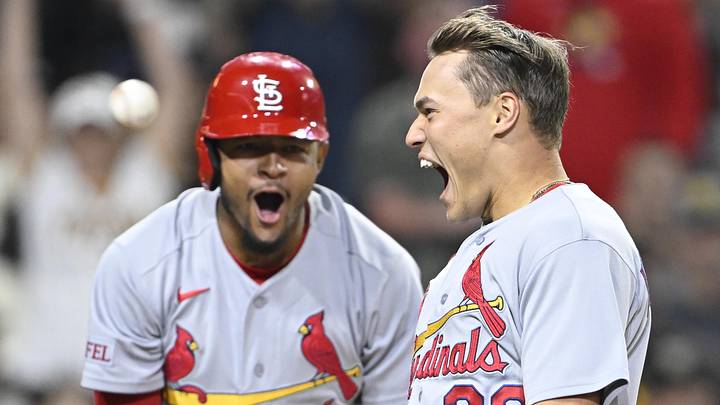 May 8, 2026; San Diego, California, USA; St. Louis Cardinals second baseman JJ Wetherholt (26), right, celebrates with center fielder Victor Scott II (11) after scoring during the fifth inning against the San Diego Padres at Petco Park. Mandatory Credit: Denis Poroy-Imagn Images