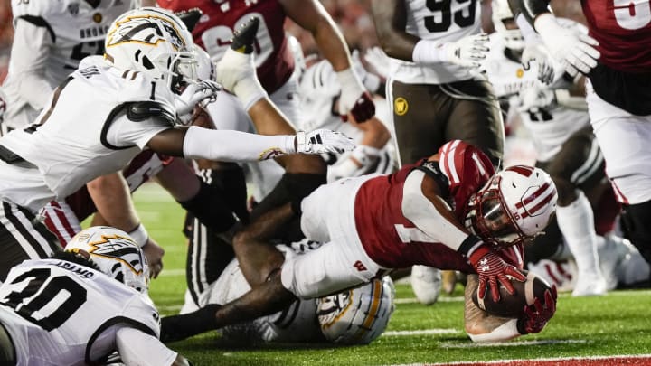 Wisconsin running back Chez Mellusi (1) rushes for a touchdown during the second quarter against Western Michigan at Camp Randall Stadium in Madison, Wis., on Aug. 30, 2024. 