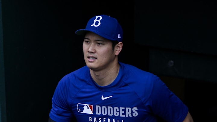 Jun 6, 2025; St. Louis, Missouri, USA; Los Angeles Dodgers designated hitter Shohei Ohtani (17) walks on to the field before a game against the St. Louis Cardinals at Busch Stadium. Mandatory Credit: Jeff Curry-Imagn Images Jun 6, 2025; St. Louis, Missouri, USA; Los Angeles Dodgers designated hitter Shohei Ohtani (17) walks on to the field before a game against the St. Louis Cardinals at Busch Stadium. Mandatory Credit: Jeff Curry-Imagn Images