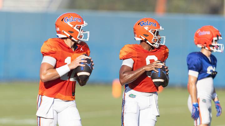 Florida 2026-2027 quarterback Aaron Philo (12) and Florida 2026-2027 quarterback Tramell Jones Jr. (9) run drills during Florida football practice at Heavener Football Complex in Gainesville, FL on Tuesday, August 18, 2026. [Alan Youngblood/Gainesville Sun]