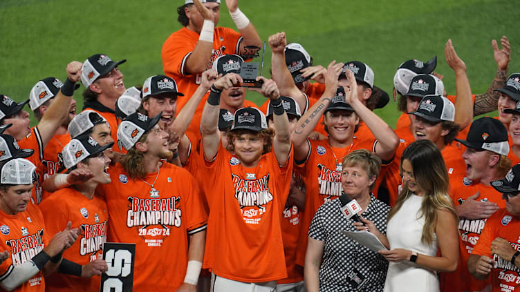 Oklahoma State's Carson Benge lifts the Most Outstanding...