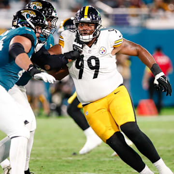 Aug 9, 2025; Jacksonville, Florida, USA; Pittsburgh Steelers defensive tackle Derrick Harmon (99) rushes the passer against the Jacksonville Jaguars during a preseason game at EverBank Stadium. Mandatory Credit: Travis Register-Imagn Images