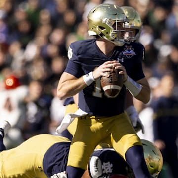 Dec 29, 2023; El Paso, TX, USA; Notre Dame Fighting Irish quarterback Steve Angeli (18) drops back to pass against the Oregon State Beavers defense in the first half at Sun Bowl Stadium. Mandatory Credit: Ivan Pierre Aguirre-Imagn Images