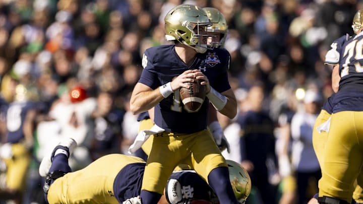 Dec 29, 2023; El Paso, TX, USA; Notre Dame Fighting Irish quarterback Steve Angeli (18) drops back to pass against the Oregon State Beavers defense in the first half at Sun Bowl Stadium. Mandatory Credit: Ivan Pierre Aguirre-Imagn Images