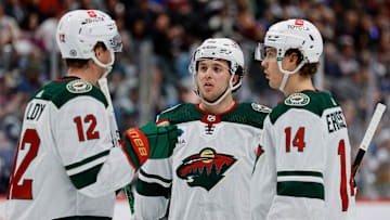 Apr 9, 2024; Denver, Colorado, USA; Minnesota Wild defenseman Brock Faber (7) and left wing Matt Boldy (12) and center Joel Eriksson Ek (14) in the first period against the Colorado Avalanche at Ball Arena. Mandatory Credit: Isaiah J. Downing-Imagn Images