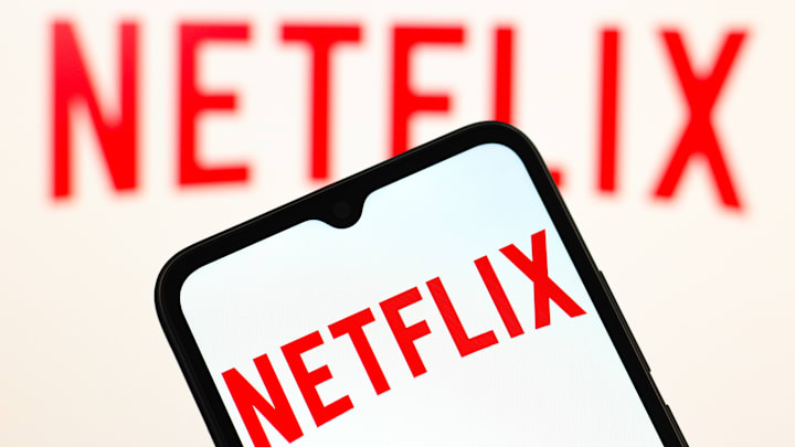 In this photo illustration, the Netflix logo is seen...