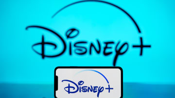 In this photo illustration, the Disney logo is seen...