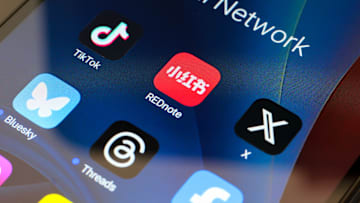 In this photo illustration, the TikTok, Xiaohongshu (Rednote...