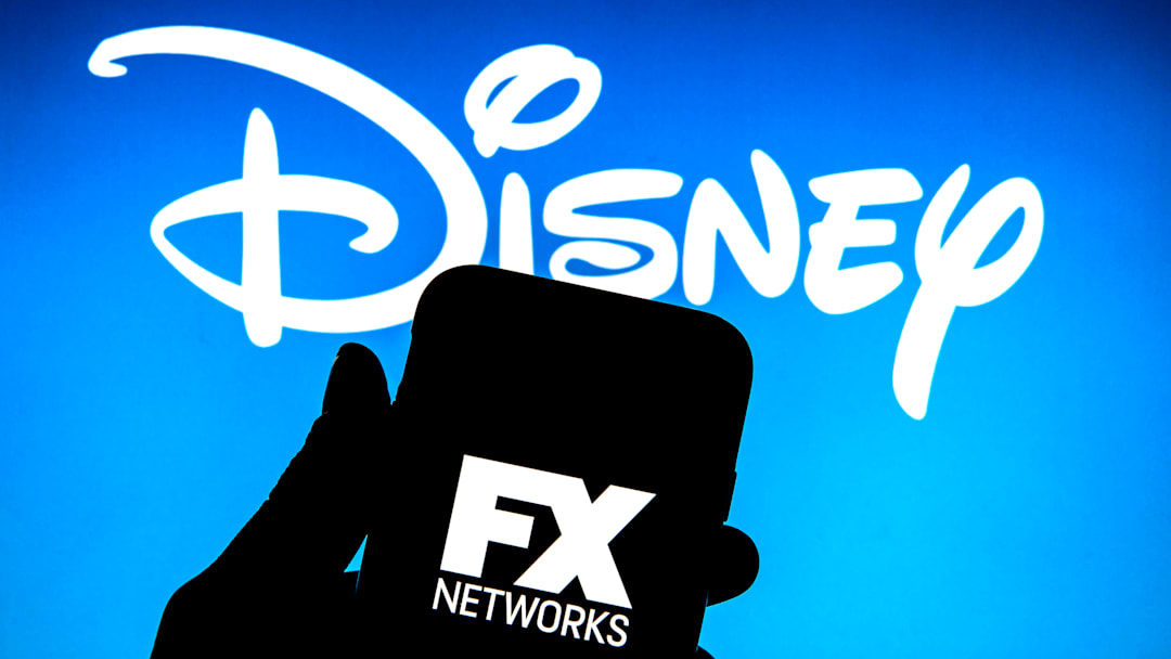 In this photo illustration a FX Networks logo seen displayed...