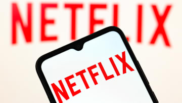 In this photo illustration, the Netflix logo is seen...
