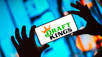 In this photo illustration, the DraftKings logo is displayed...