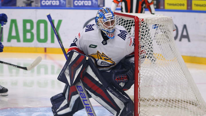 Metallurg Hockey Club player, Ilya Nabokov (30) seen in...
